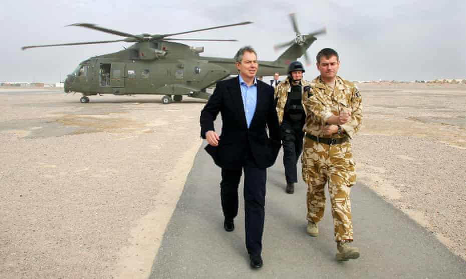 Tony Blair arriving at Basra airport in Iraq in December 2004 for meetings with senior military officers.