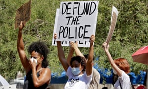 Protesters rally in Phoenix, demanding the city council defund the Phoenix police department on 3 June 2020.