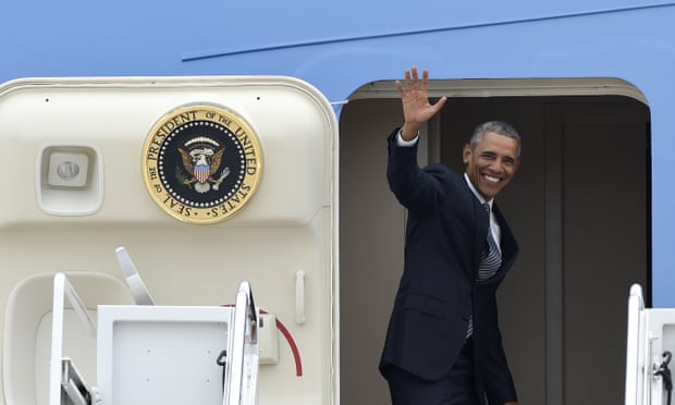 President Barack Obama waves from the top of the steps of Air Force One at Andrews air force base in Maryland on Monday as he sets off on a three-day trip to Alaska.