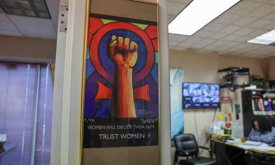 A poster supporting women’s rights hangs outside the office of Shannon Brewer, the director of the Jackson clinic, the only abortion provider in the state.