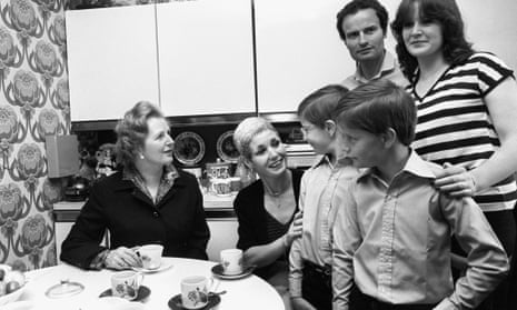 Margaret Thatcher with a family who had bought their council house in Harold Hill in 1980