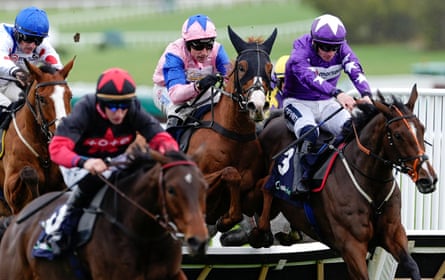 Harry Skelton and Fortune De Mer (pink and blue colours) at the last hurdle before victory at Cheltenham yesterday.