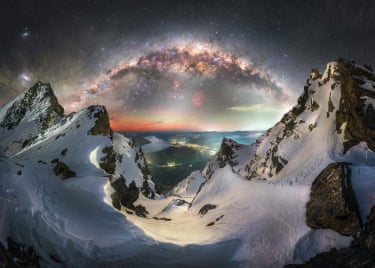 The galactic centre of the Milky Way, composed of billions of stars, gas, and dust, rises above an icy, ancient landscape deep within Aoraki / Mount Cook National Park in New Zealand, part of the largest Gold Tier Dark Sky Reserve in the world