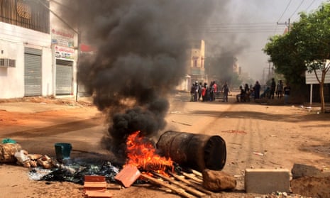 Protesters block a road in Khartoum, Sudan
