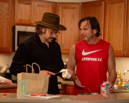 Cooper and Arnett at a counter in Is This Thing On?