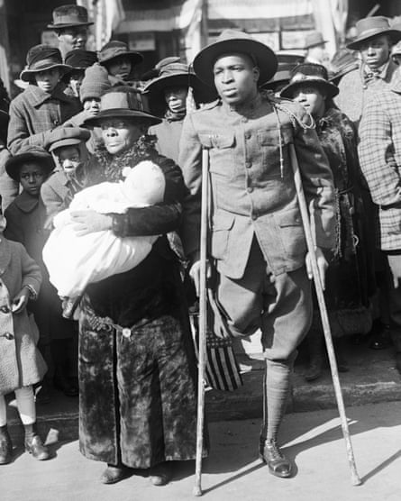 A wounded black US soldier attends a victory parade in New York in 1919.