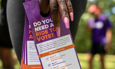 hand holds document that says ‘do you need a ride to vote’