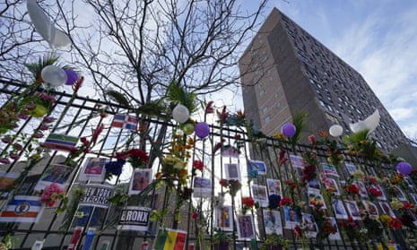 A memorial for the victims of an apartment building fire is displayed in front of the building in the Bronx borough of New York, Thursday, Jan. 13, 2022. Many of the victims of New York City’s deadliest fire in years are still awaiting burial after funerals began with services for two children killed by Sunday’s blaze in a Bronx apartment building. (AP Photo/Seth Wenig)