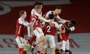 Arsenal’s Granit Xhaka celebrates scoring their second goal with teammates.