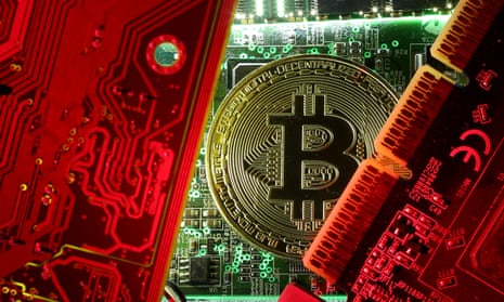 Bitcoin standing on PC motherboard.