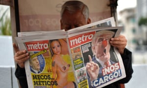 A Mexican man reads a paper emblazoned with news on Donald Trump.