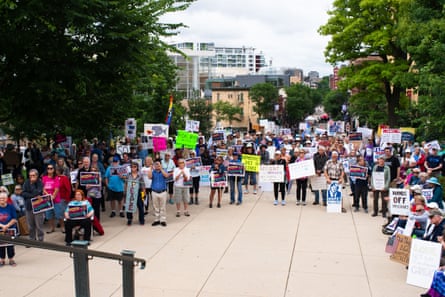 a large group of people with signs