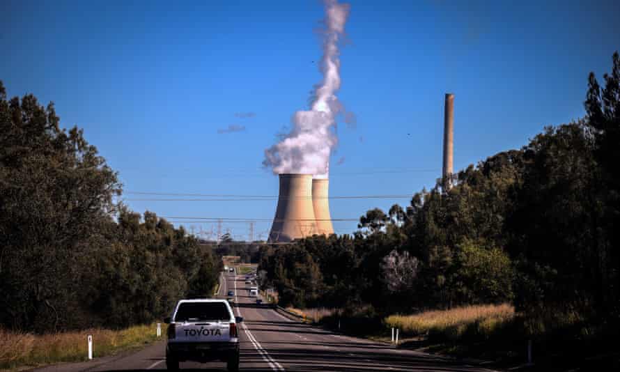Smoke and steam rises from the Bayswater coal-powered thermal power station located near the central New South Wales town of Muswellbrook