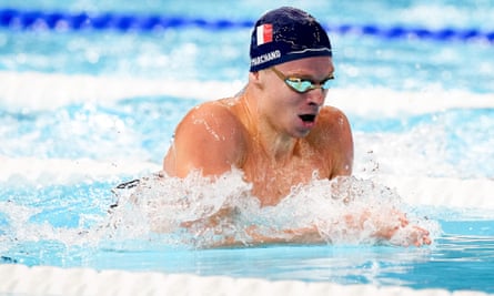 Léon Marchand swims