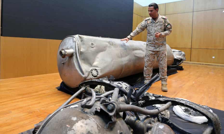 Colonel Turki al-Malki, a spokesman for the Saudi-led coalition forces, displays debris from a ballistic missile launched by Houthi rebels in Yemen towards the Saudi capital, Riyadh.