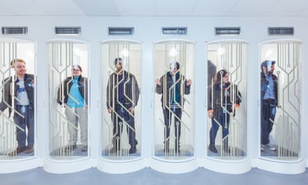 Contestants locked-in to pods as part of the Crystal Maze interactive game in London.