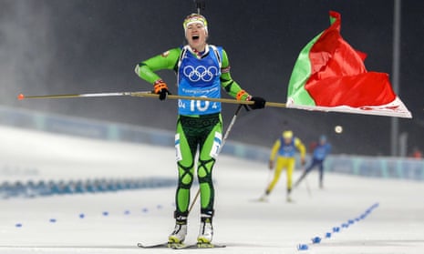 Darya Domracheva, of Belarus, skis across the finish line for the gold medal during the women’s 4x6km biathlon relay.