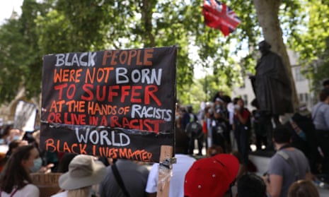 Protesters from a Black Lives Matter rally gather at Parliament Square in London last July.