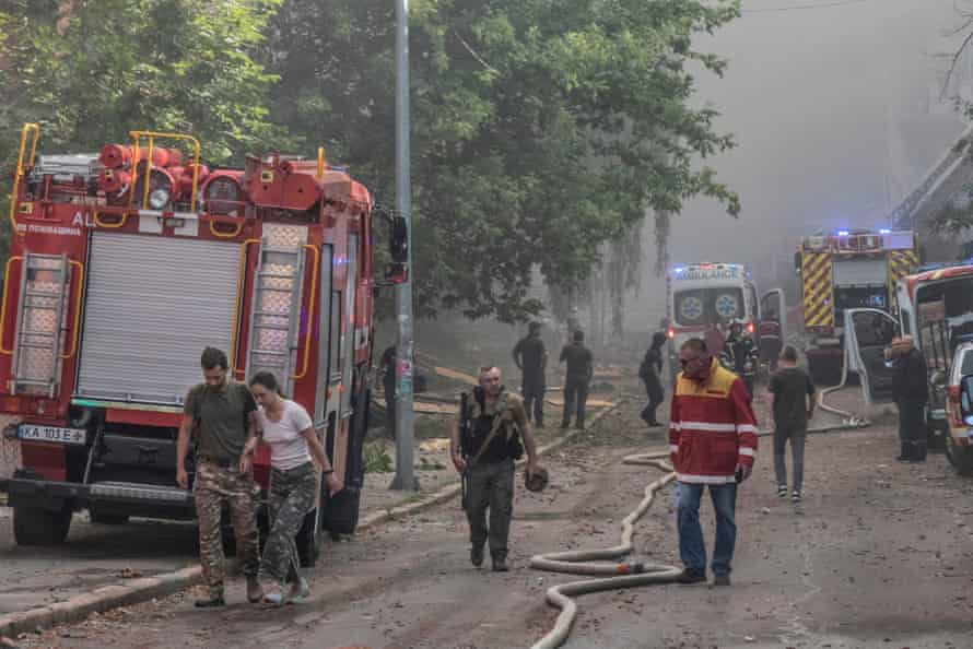 Russia-Ukraine war: Kyiv hit by missile strikes; G7 leaders gather in Germany – live updates 5 Emergency crews respond following a Russian missile strike on the district of Shevchenkivskyi.
