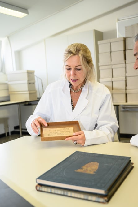 Sabine Eggers holds an inventory record relating to one of the ancestral remains taken by Andreas Reischek
