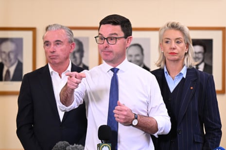 Nationals leader David Littleproud (centre), deputy leader Kevin Hogan (left) and Senate leader Bridget McKenzie speak to the media at Parliament House on Tuesday.