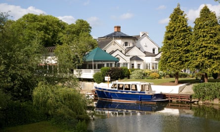 A view across the Thames to the hotel on Monkey Island, near Bray, Berkshire.