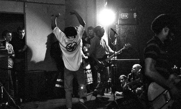 Bad Brains performing in 1982, watched by Nancy Barile, with short blond hair, bottom right.