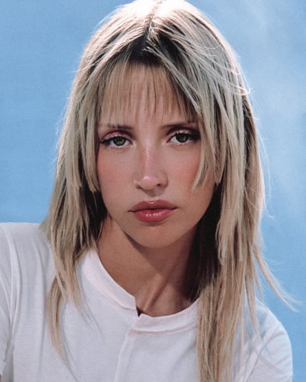 Portrait of Angele with straight bleached hair