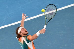 Stefanos Tsitsipas stretches for a return.