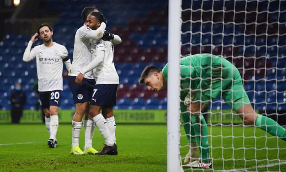 Manchester City’s two goalscorers, Gabriel Jesus and Raheem Sterling, celebrate the latter’s goal against Burnley.