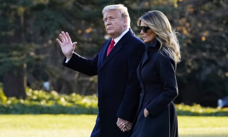 Donald Trump and Melania walk to board Marine One on the South Lawn of the White House on Wednesday to travel to Florida for the festive break.