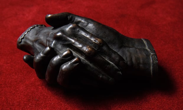  a bronze cast of the Clasped Hands of Robert and Elizabeth Barrett Browning by Harriet Goodhue Hosmer.