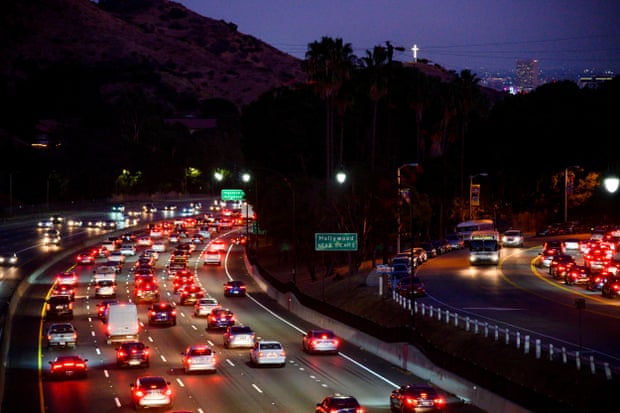 Motor vehicles drive on the 101 freeway in Los Angeles, California. Critics say the move will lead to more life-threatening air pollution and force Americans to spend more on gasoline.
