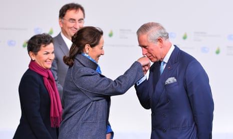 Prince Charles greeted by Segolene Royal, French minister of ecology, sustainable development and energy at the Paris climate summit.