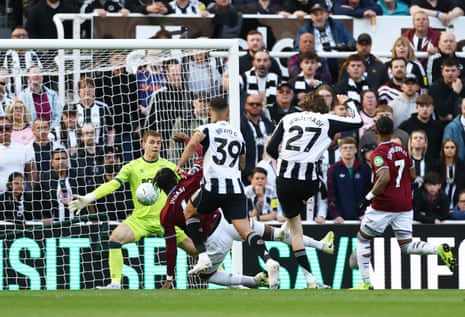 Newcastle United's Nick Woltemade scores their first goal past West Ham United's Mads Hermansen.