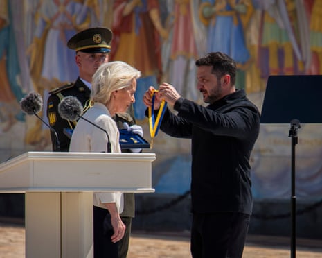 Ukrainian president Volodymyr Zelenskyy, right, awards European Commission president Ursula von der Leyen in Kyiv, Ukraine.
