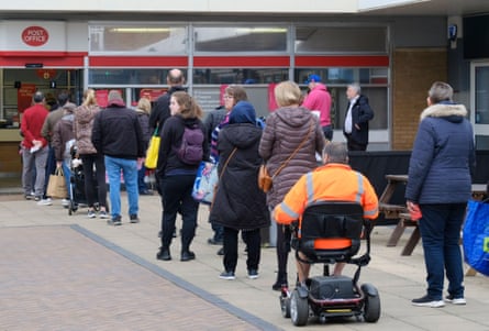 A queue at a Post Office branch