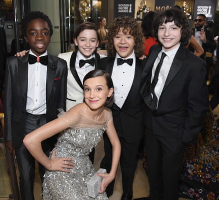 ‘We just thought we were filming this secret thing that no one knew about’: (from left) Caleb McLaughlin, Noah Schnapp, Gaten Matarazzo, Finn Wolfhard and (bottom) Millie Bobby Brown at the 74th annual Golden Globe Awards.