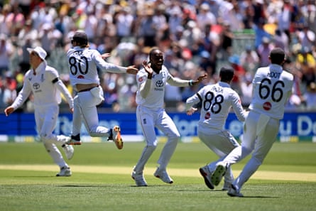 England players cavort after Jofra Archer (centre) dismisses Cameron Green for a duck.