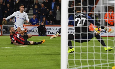 Eden Hazard of Chelsea scores the first goal past Bournemouth keeper Asmir Begovic.