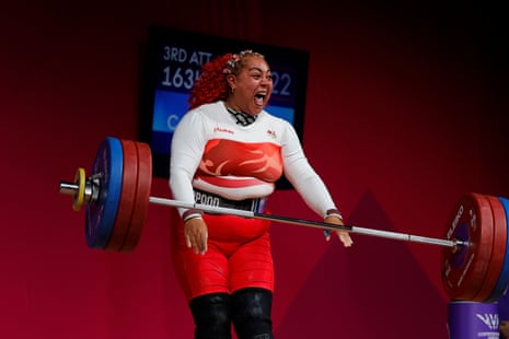 Emily Campbell of England celebrates breaking the Commonwealth Games record and winning the gold medal in the women