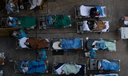 Patients wait for medical treatment at a temporary shelter outside the Caritas Medical Center in Hong Kong.