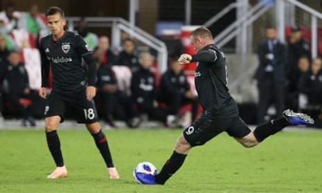 Wayne Rooney prepares to take the free-kick that sealed Wednesday’s game against Toronto