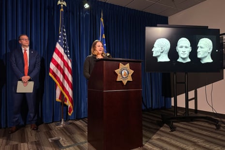 Coroner Melanie Rouse speaks at a podium as facial reconstruction images are shown on screen