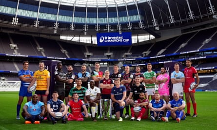 Players from the Champions Cup clubs, including Owen Farrell (back row, seventh from left), at the launch of the competition at Tottenham Hotspur Stadium in London.