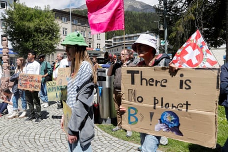 Activists from Fridays for Future hold a climate strike at World Economic Forum, in DavosClimate activists hold signs, during a Fridays for Future climate strike on the last day of the World Economic Forum (WEF), in the alpine resort of Davos, Switzerland May 26, 2022. REUTERS/Arnd Wiegmann