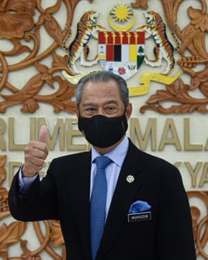Coronavirus live news: half a million under lockdown in Beijing; new curbs as Malaysia hits 'breaking point' | World news 1 Malaysia’s prime minister, Muhyiddin Yassin
