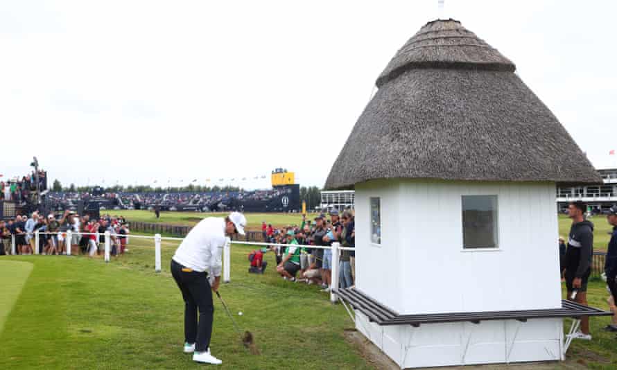 Justin Rose plays his second shot on the 18th hole.