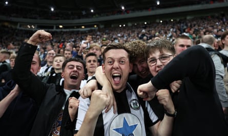 Newcastle fans enjoy their 4-1 win against PSG in the Champions League.