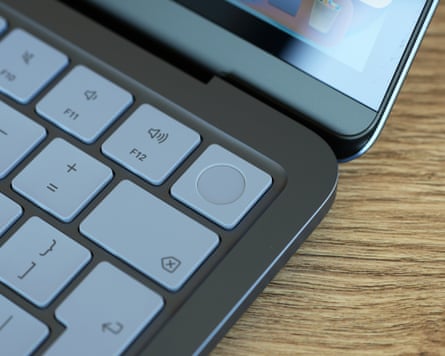 The Touch ID fingerprint scanner of an Apple MacBook Neo.